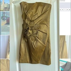 Strapless body forming gold dress with built in boning for all the support!